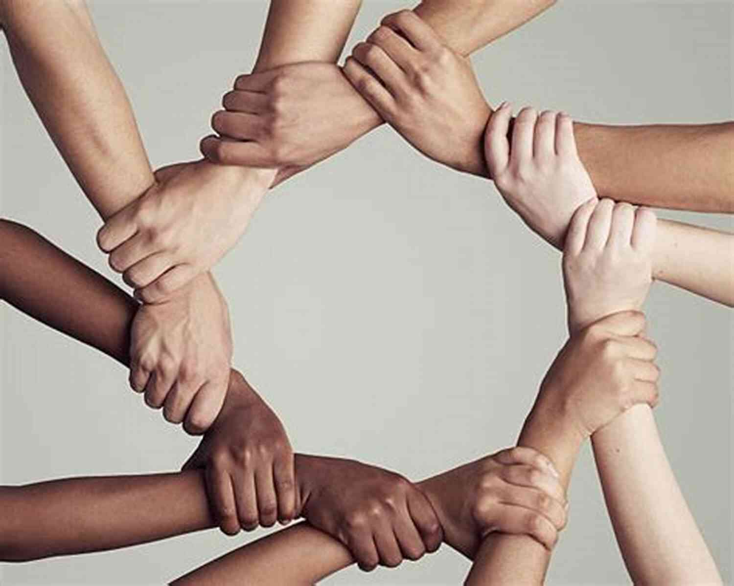A Diverse Group Of People Holding Hands, Representing Unity It Starts With Us: A Novel (It Ends With Us 2)